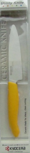 Kyocera COLTELLO CERAMICA bianca lama da cm 11 . Manico giallo
