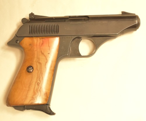 Bernardelli PISTOLA Mod. USA Cal.7,65B . Guancette in radica